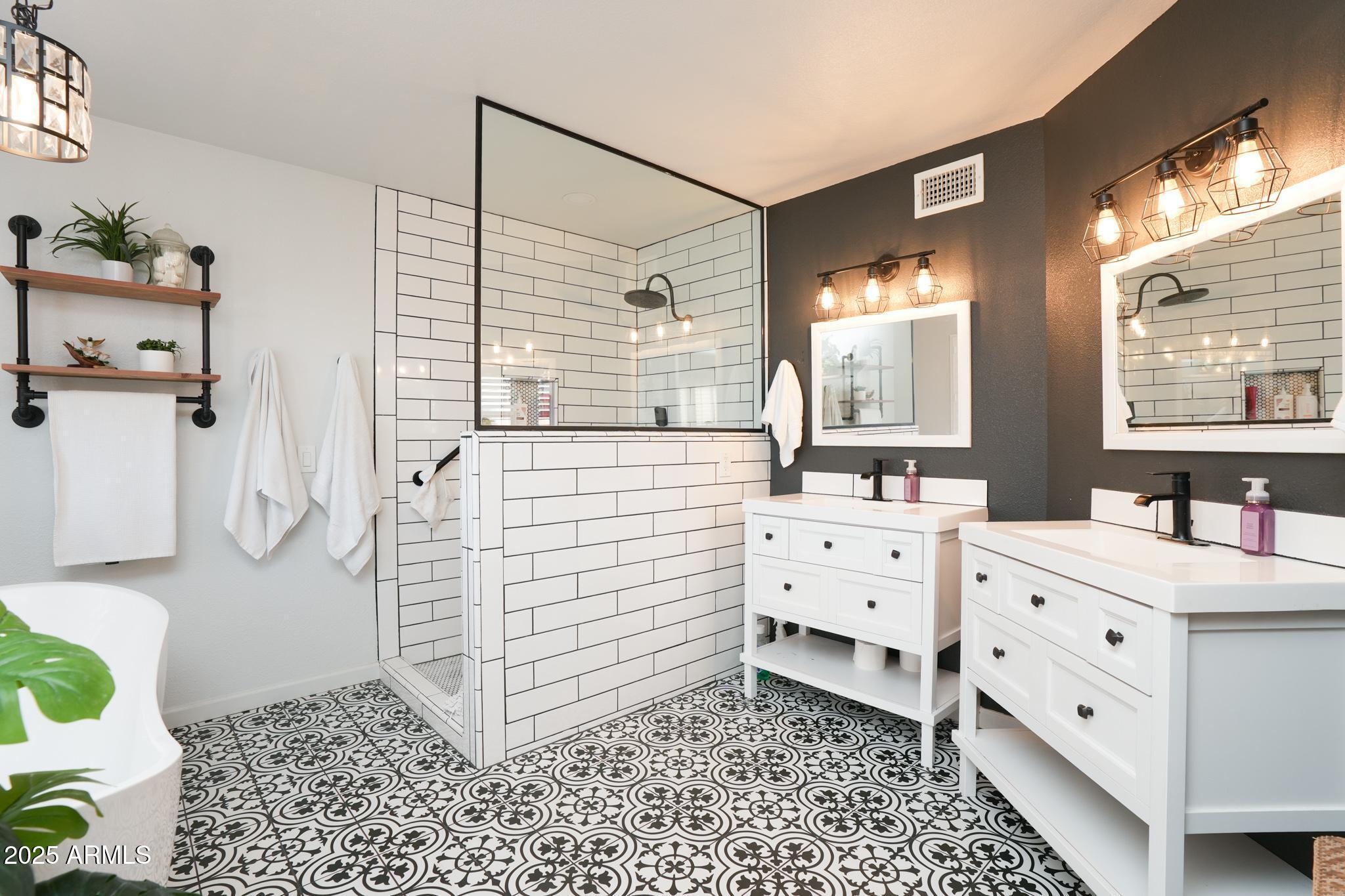 1665 Mountain View Road Cornville, AZ 86325 - Photo 20 of 46 a bathroom with a sink a vanity and a mirror