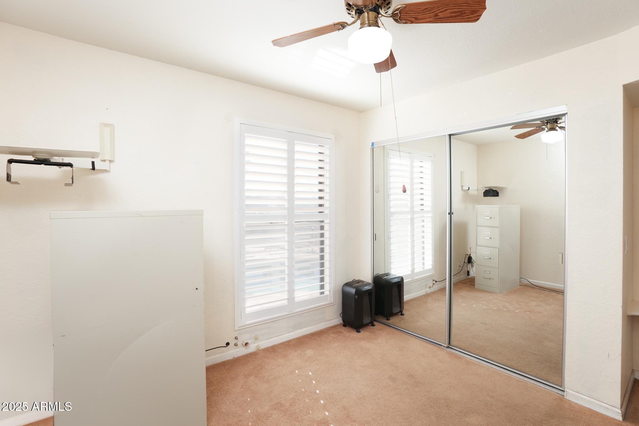 1665 Mountain View Road Cornville, AZ 86325 - Photo 24 of 46 a view of an empty room with a window