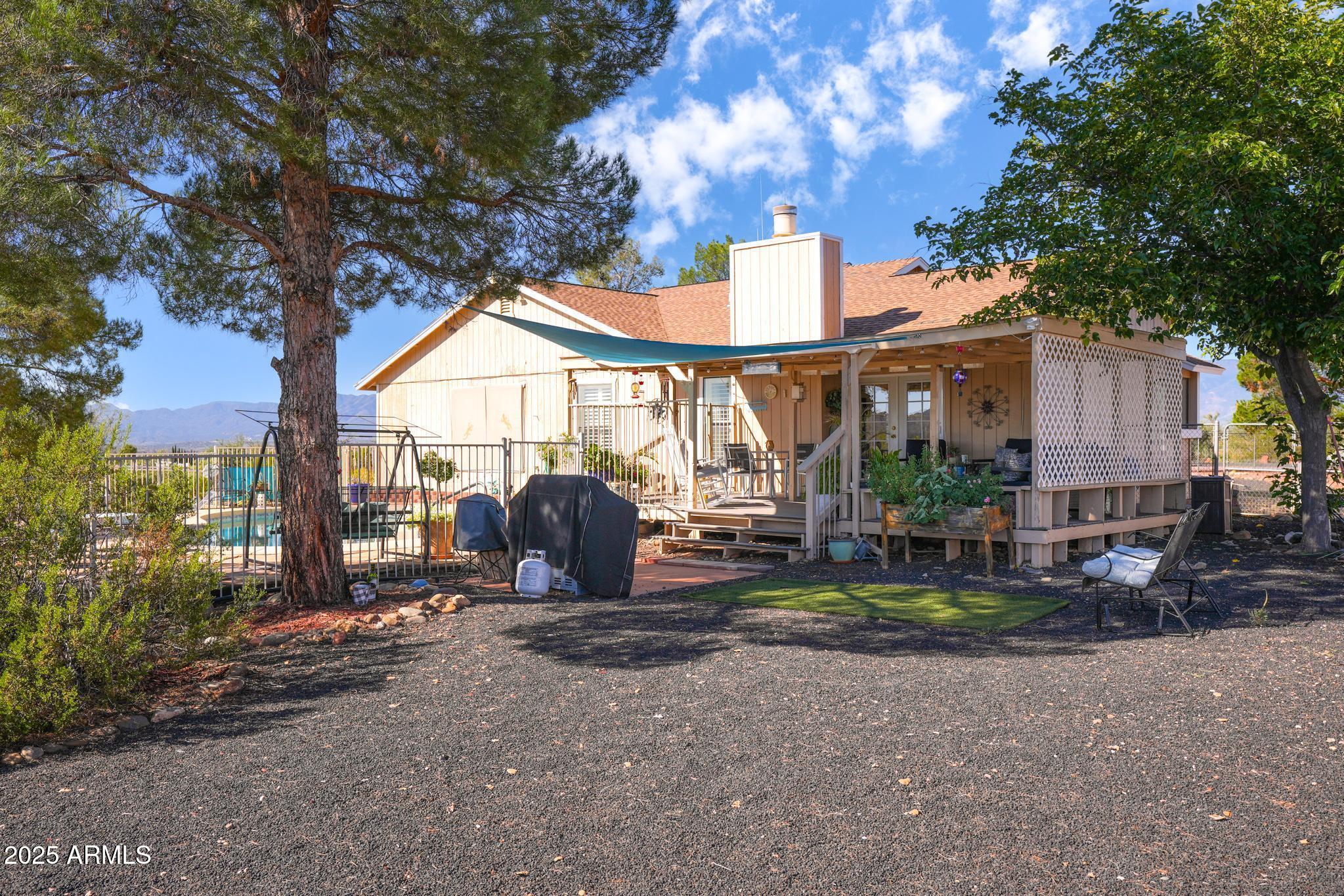 1665 Mountain View Road Cornville, AZ 86325 - Photo 32 of 46 a view of house with outdoor space and sitting area
