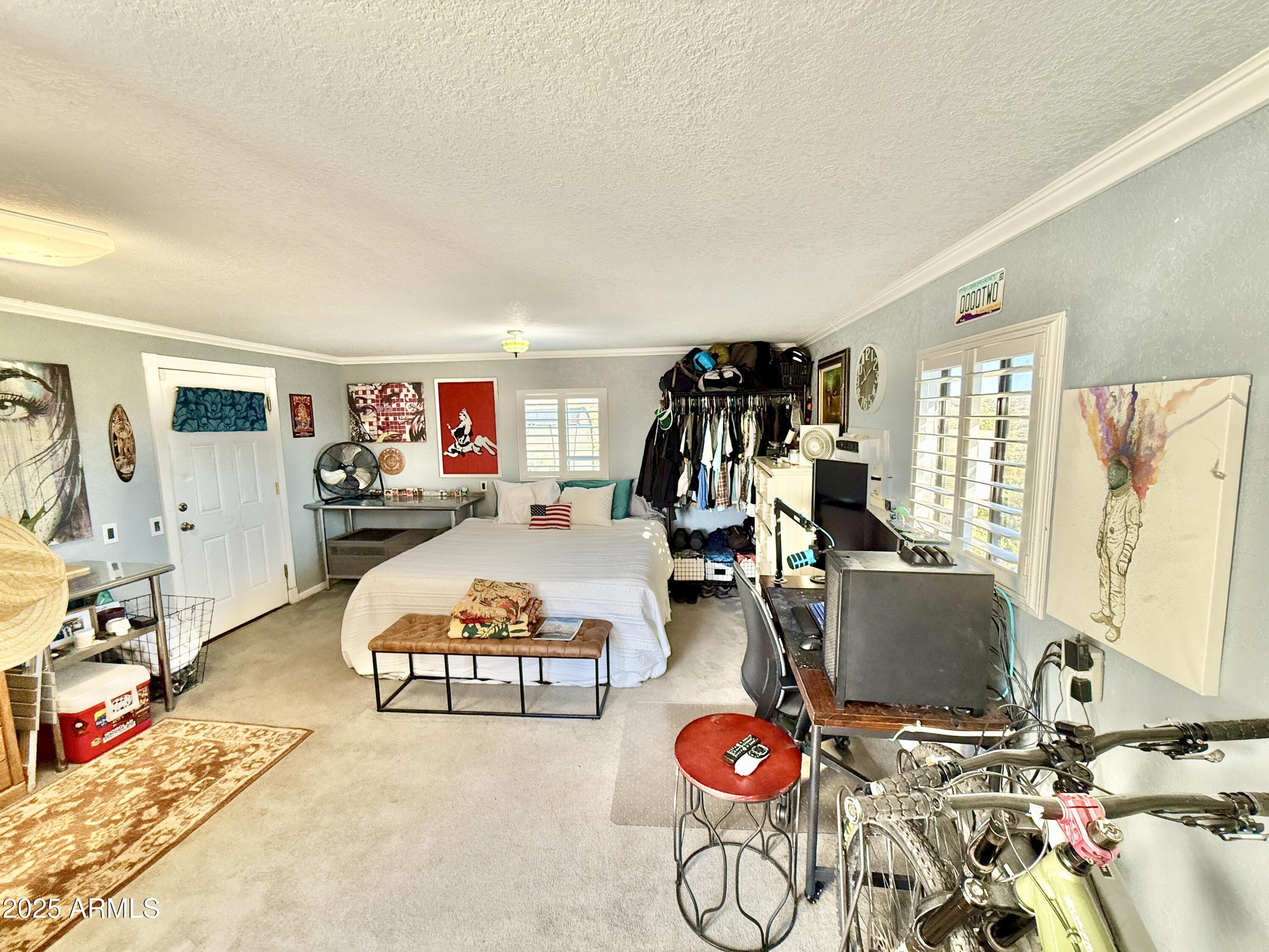 1665 Mountain View Road Cornville, AZ 86325 - Photo 40 of 46 a view of a livingroom with furniture and a rug