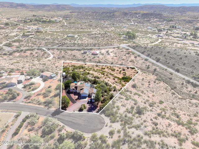 a view of a swimming pool with an ocean view