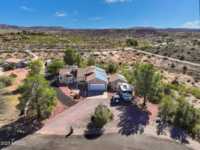 an aerial view of a town with couple of houses