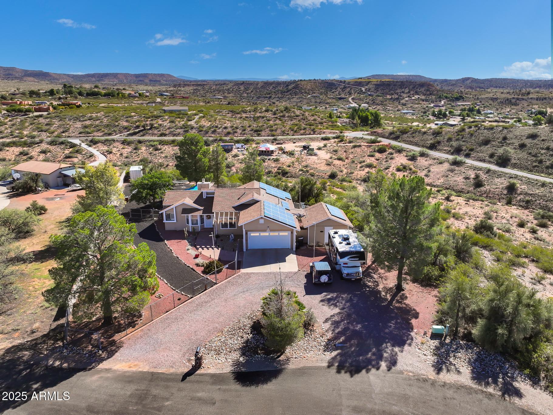 1665 Mountain View Road Cornville, AZ 86325 - Photo 5 of 46 an aerial view of a town with couple of houses