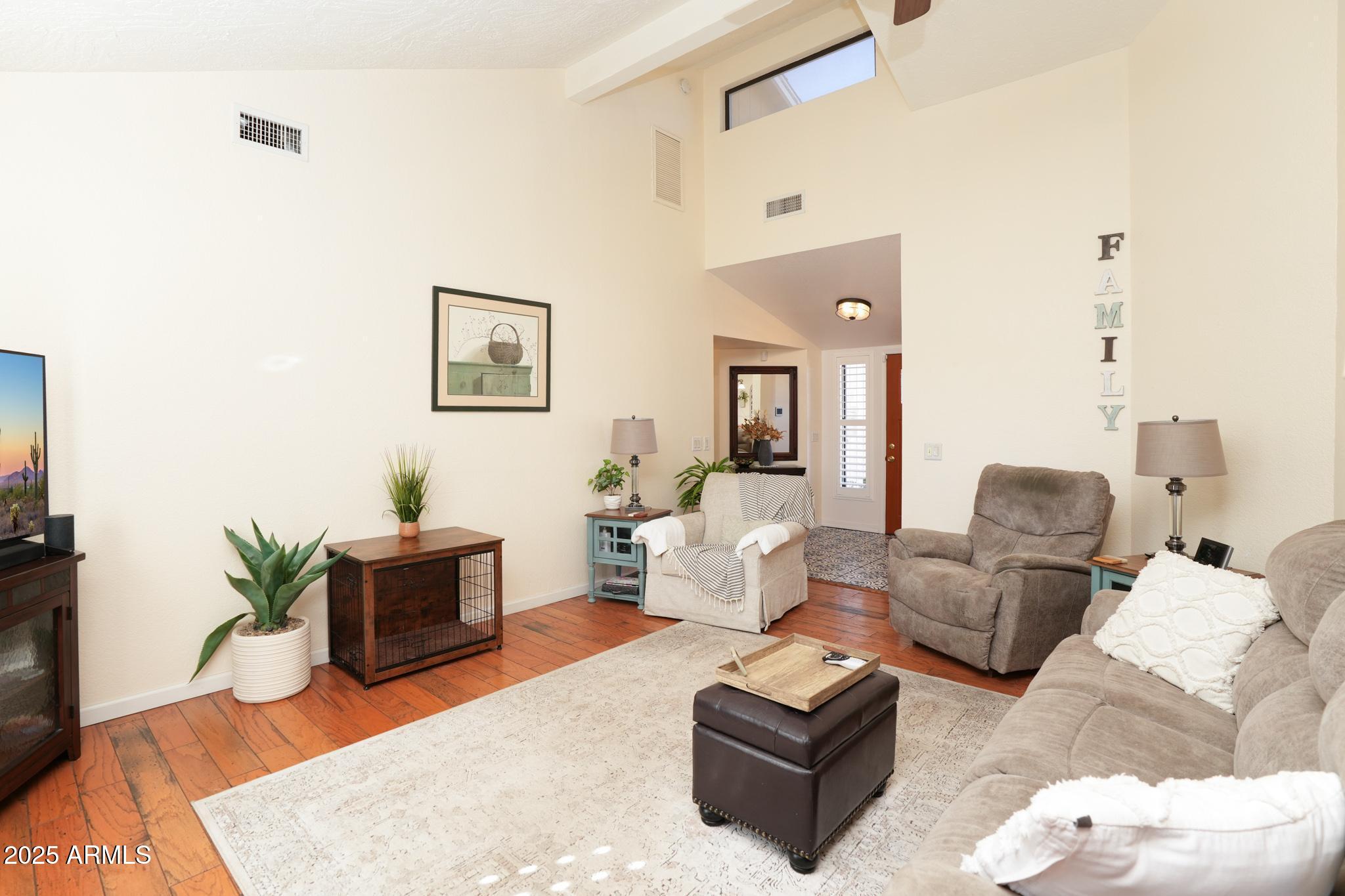 1665 Mountain View Road Cornville, AZ 86325 - Photo 9 of 46 a living room with furniture or couch and a flat screen tv
