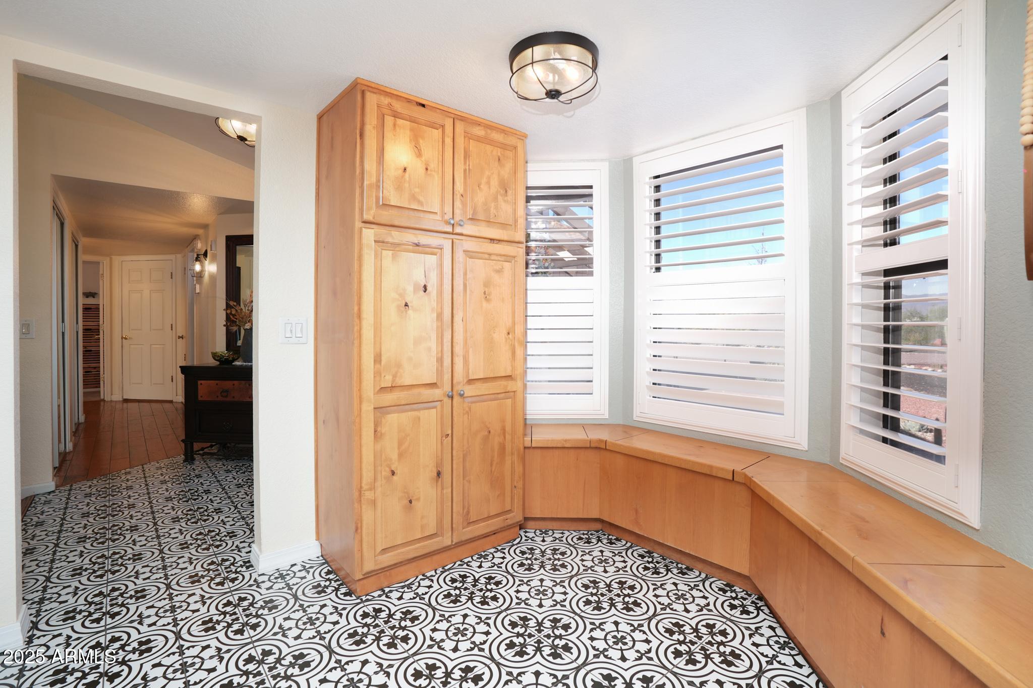 1665 Mountain View Road Cornville, AZ 86325 - Photo 10 of 46 a view of a hallway with closet and a window