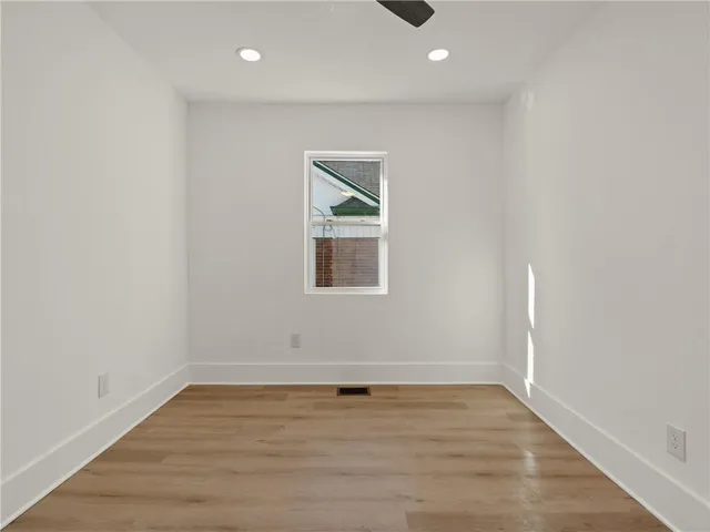 a view of a bathroom from the hallway