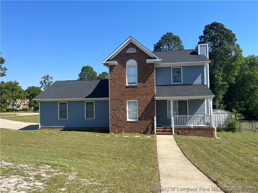 11 Overlook Road Cameron, NC 28326 - Photo 1 of 12 front view of a house with a yard