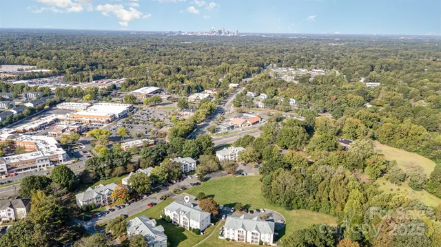 an aerial view of residential building with parking space
