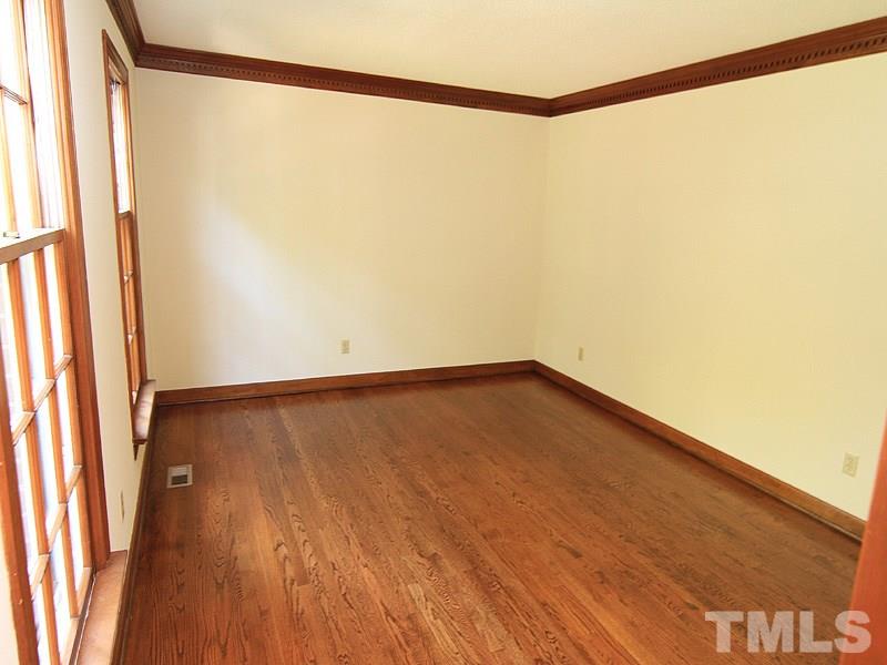 8013 Old Deer Trail Raleigh, NC 27615 - Photo 12 of 23 Formal living room can be the perfect office if you choose!