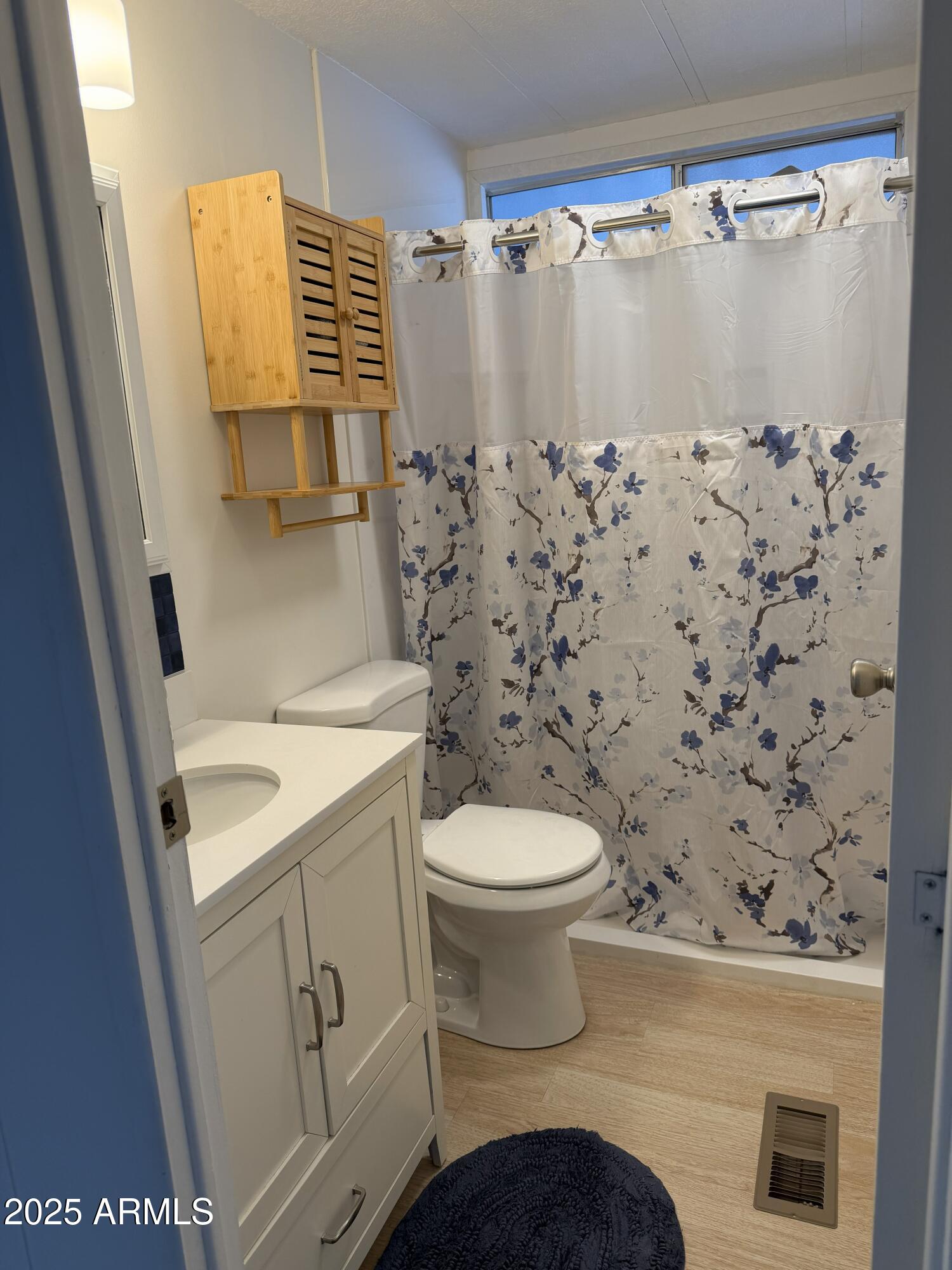 351 North Meridian Drive, Unit 2 Apache Junction, AZ 85120 - Photo 15 of 26 a bathroom with a sink and a toilet
