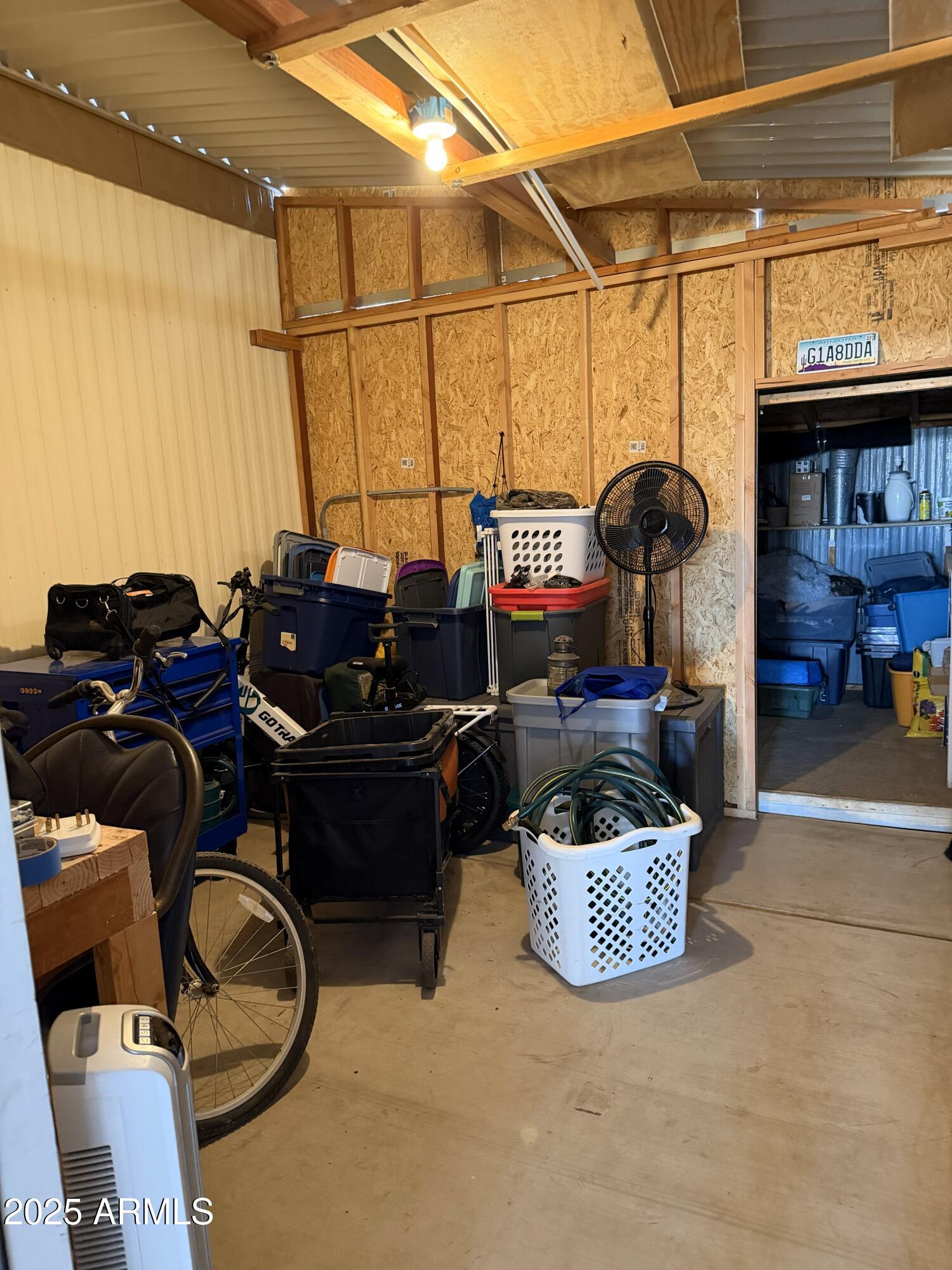 351 North Meridian Drive, Unit 2 Apache Junction, AZ 85120 - Photo 18 of 26 a living room with furniture a flat screen tv and dresser