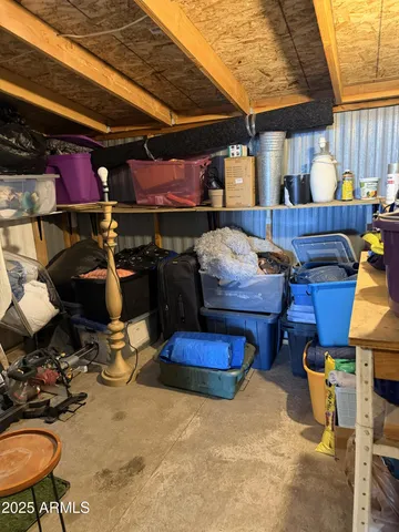 a room with lots of furniture and clutter