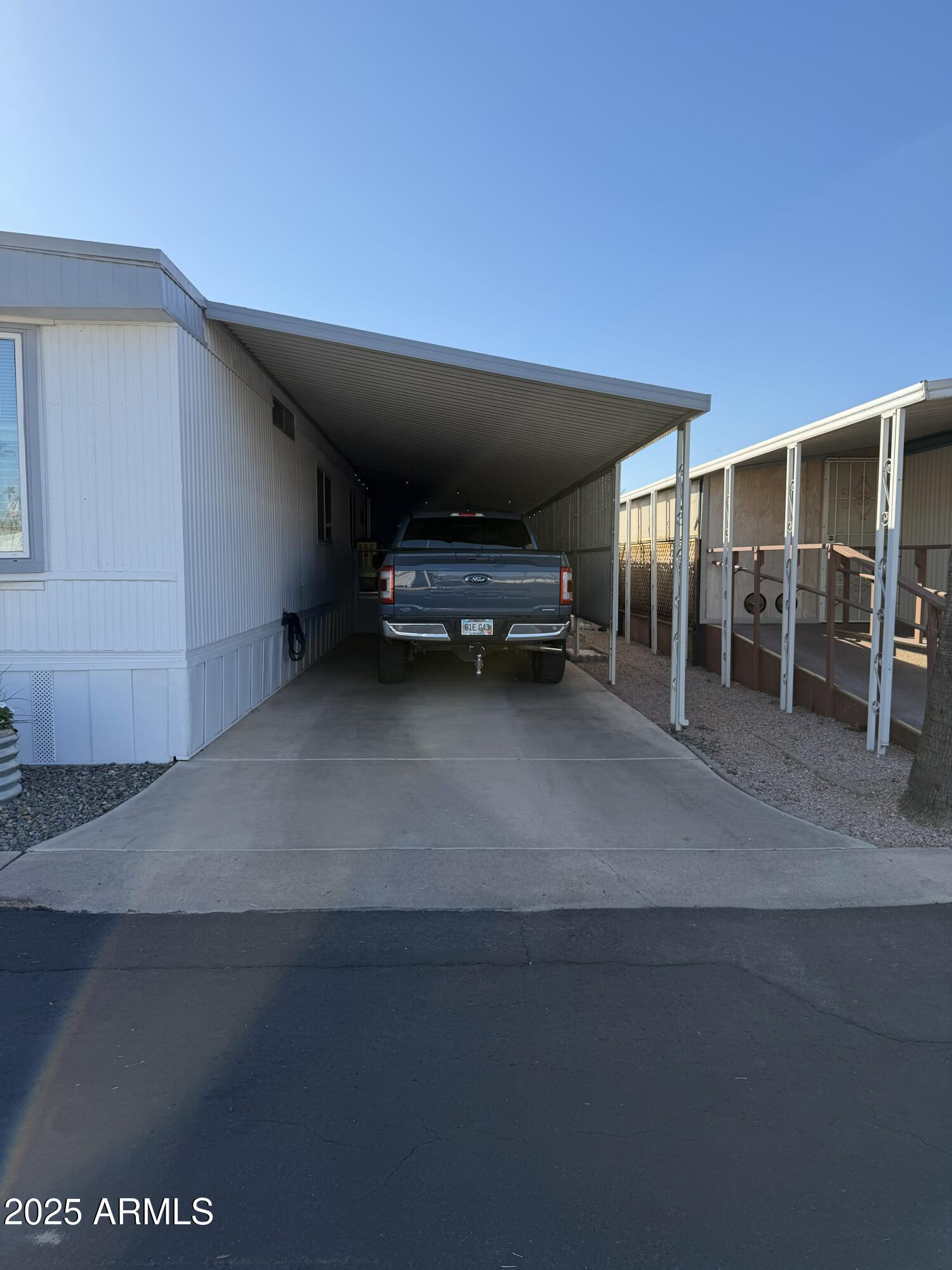 351 North Meridian Drive, Unit 2 Apache Junction, AZ 85120 - Photo 2 of 26 a view of parking area