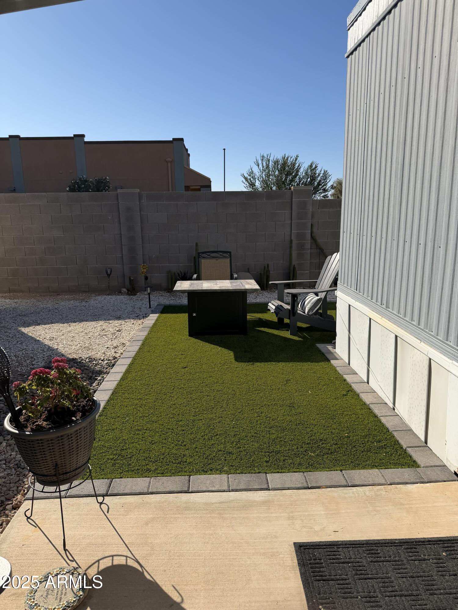 351 North Meridian Drive, Unit 2 Apache Junction, AZ 85120 - Photo 22 of 26 a view of a couches in the patio