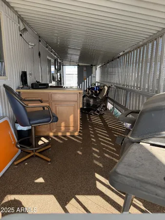 a view of balcony with a palm tree