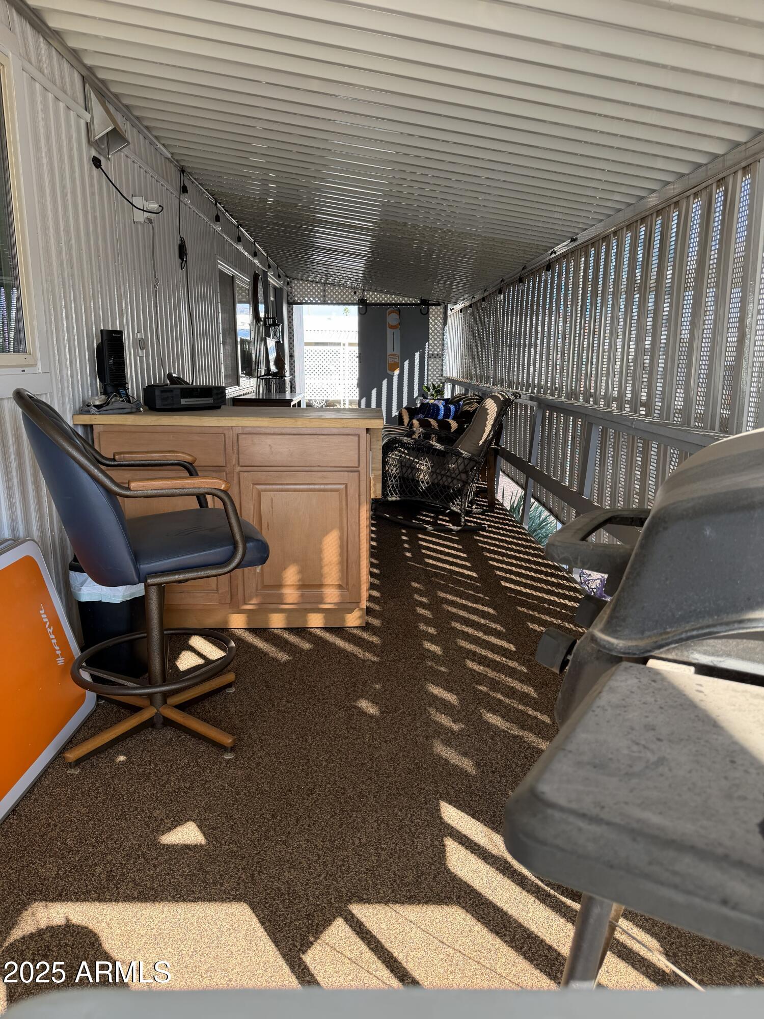 351 North Meridian Drive, Unit 2 Apache Junction, AZ 85120 - Photo 23 of 26 a room with gym equipment