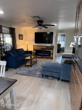 a large kitchen with a table and chairs