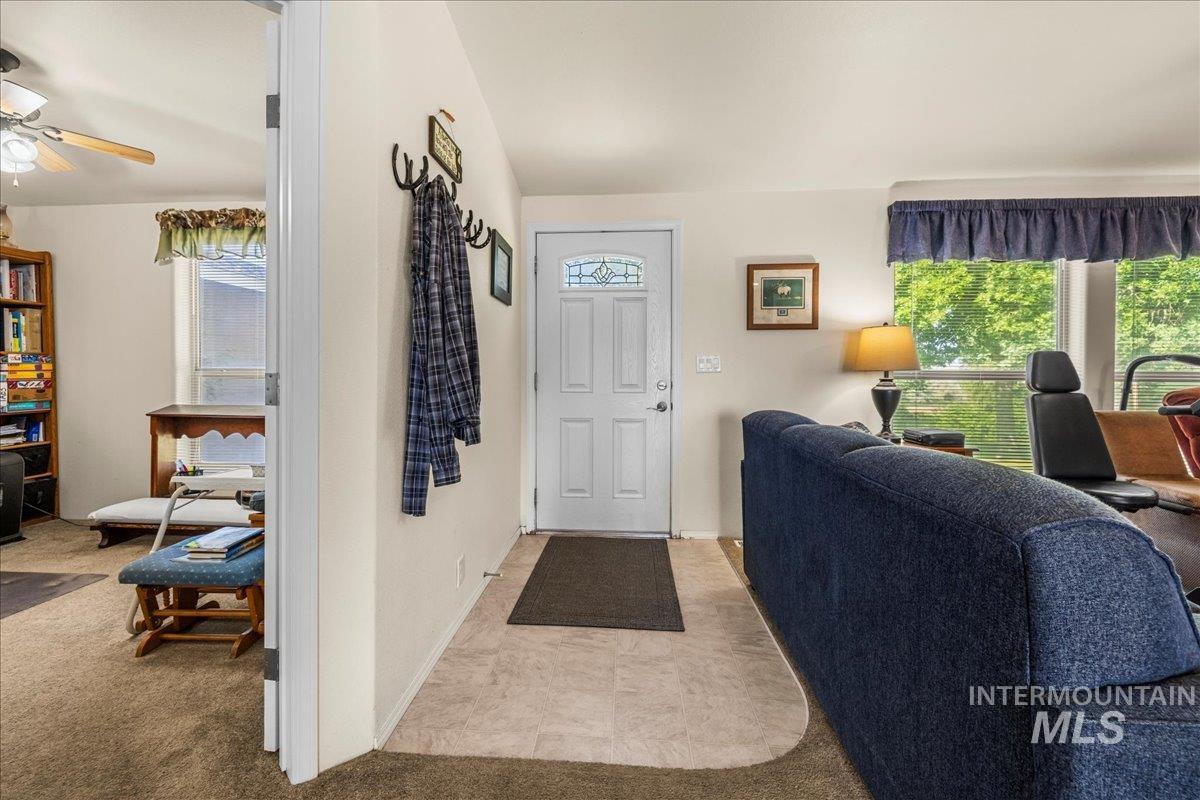37786 Highway 78 Grand View, ID 83624 - Photo 22 of 50 Entryway with carpet floors, plenty of natural light, and a ceiling fan