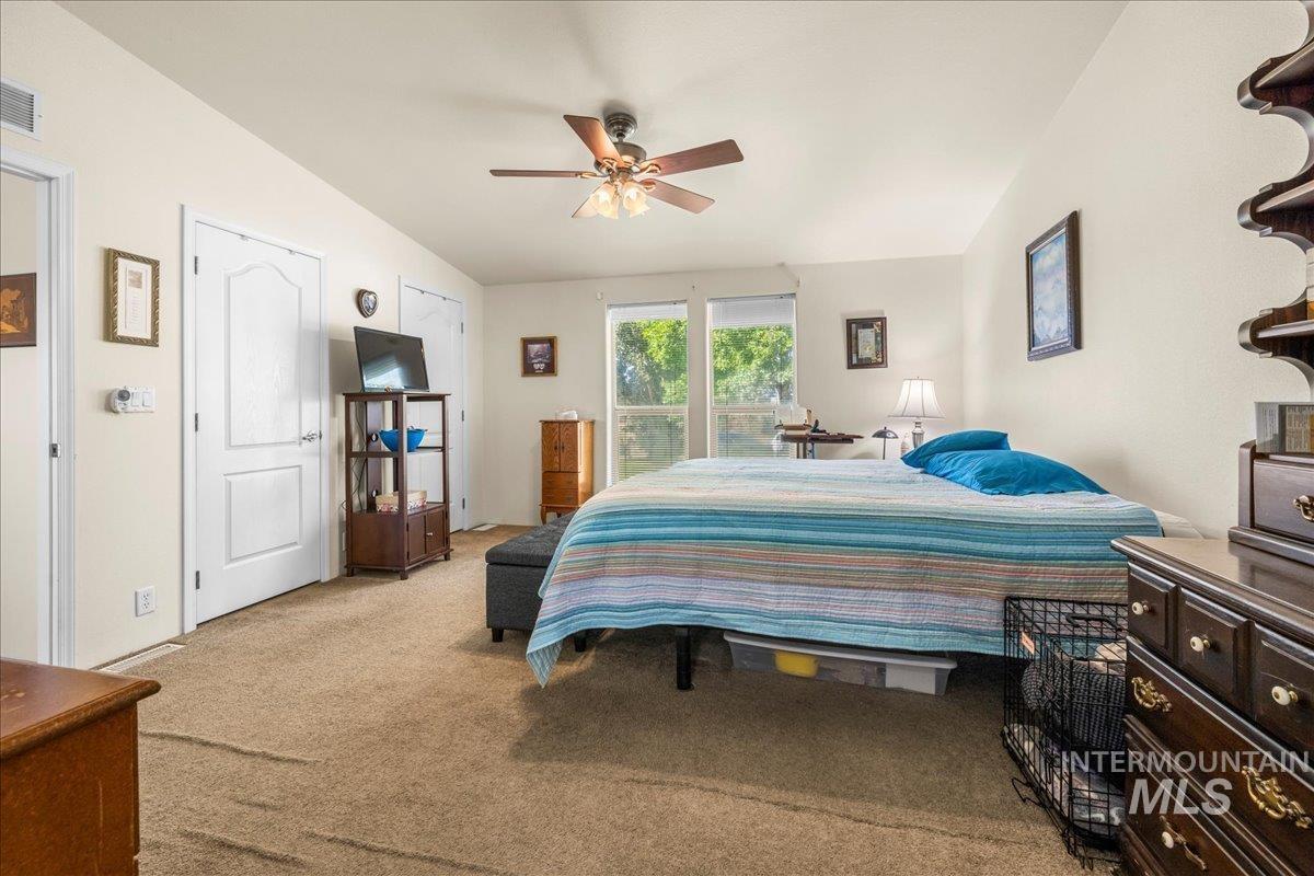 37786 Highway 78 Grand View, ID 83624 - Photo 31 of 50 Carpeted bedroom featuring ceiling fan