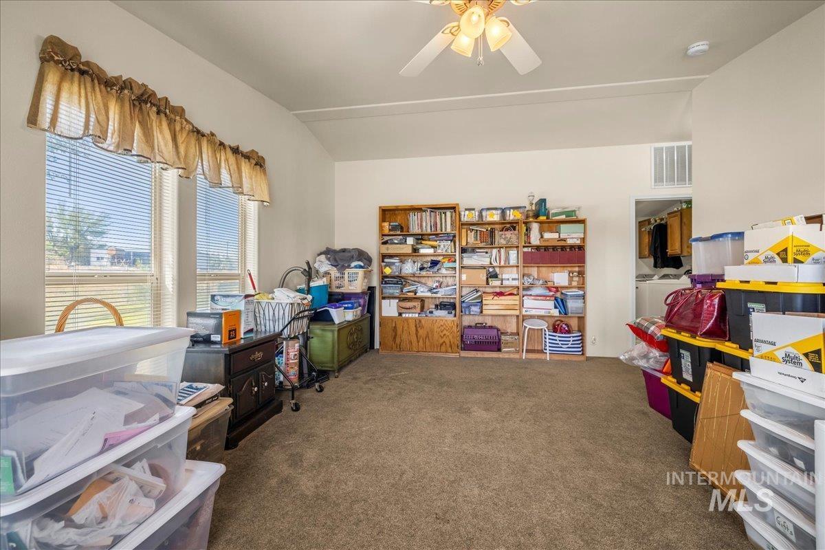37786 Highway 78 Grand View, ID 83624 - Photo 33 of 50 Office featuring carpet, washing machine and dryer, a ceiling fan, and vaulted ceiling