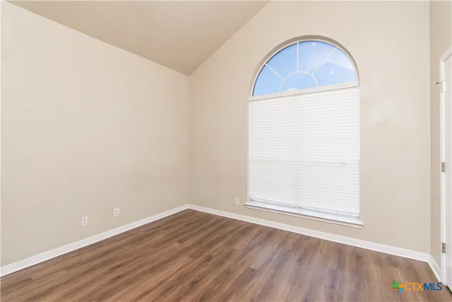 an empty room with a window