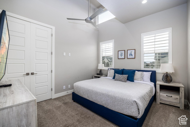 2600 Ocotillo Way, Unit 34 Santa Clara, UT 84765 - Photo 15 of 43 Bedroom with dark carpet, a closet, and ceiling fan