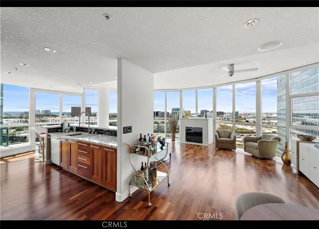 a kitchen with lots of counter top space and stainless steel appliances