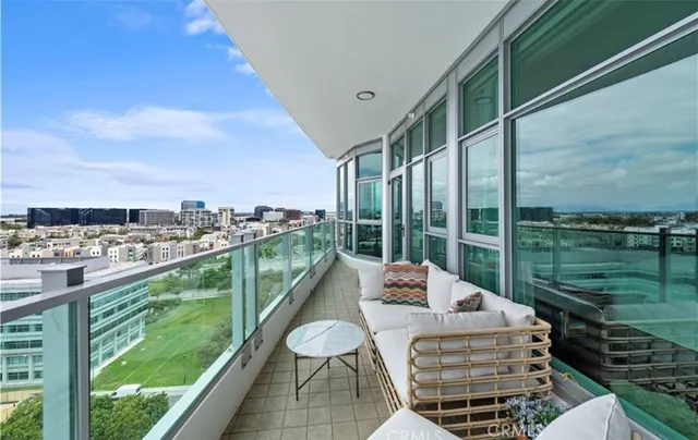 a balcony with a couch