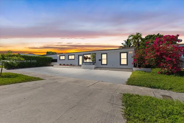 a house view with a garden space