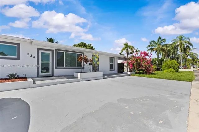 a front view of house with yard