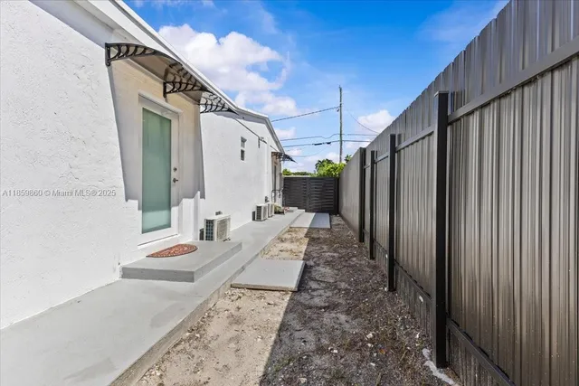 a view of a back yard with porch