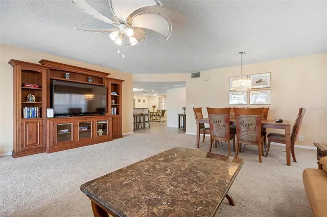 a bedroom with a bed and a lamp