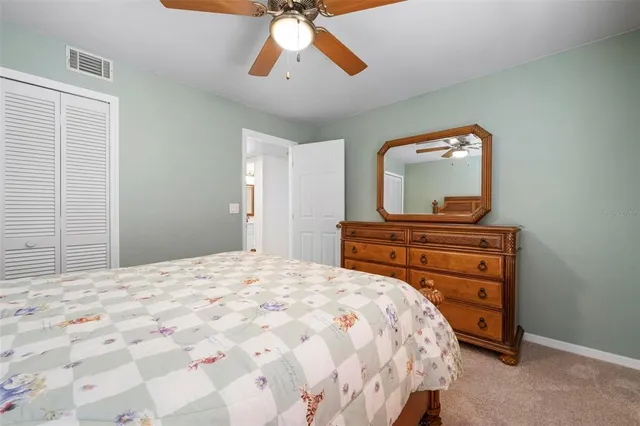a view of a swimming pool with a lounge chair