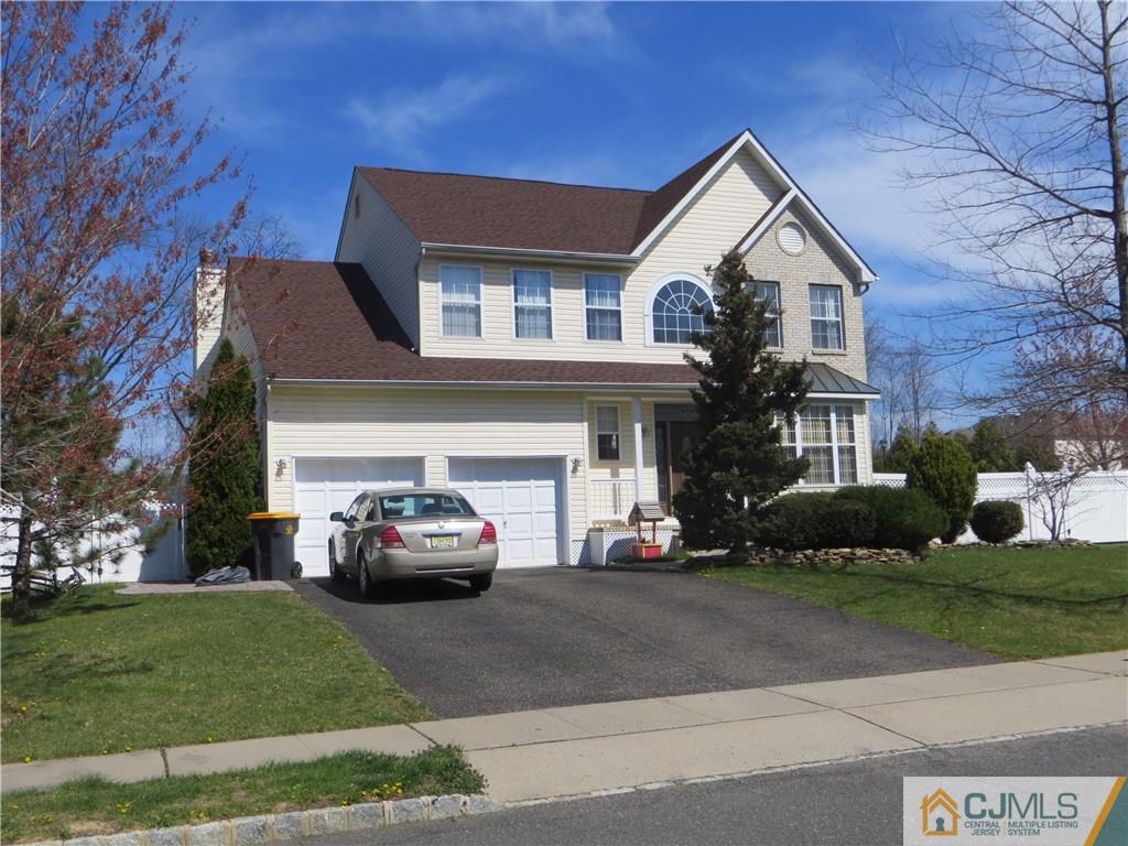 51 Stratton Road Old Bridge, NJ 07747 - Photo 1 of 25 a front view of a house with a yard