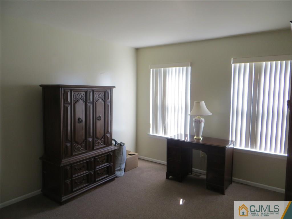 51 Stratton Road Old Bridge, NJ 07747 - Photo 14 of 25 a room with furniture and window