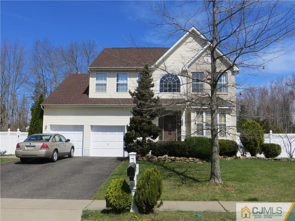 51 Stratton Road Old Bridge, NJ 07747 - Photo 3 of 25 a front view of a house with a garden