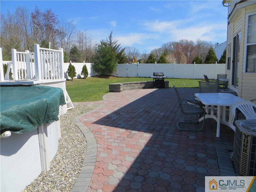 51 Stratton Road Old Bridge, NJ 07747 - Photo 22 of 25 a view of a backyard with sitting area