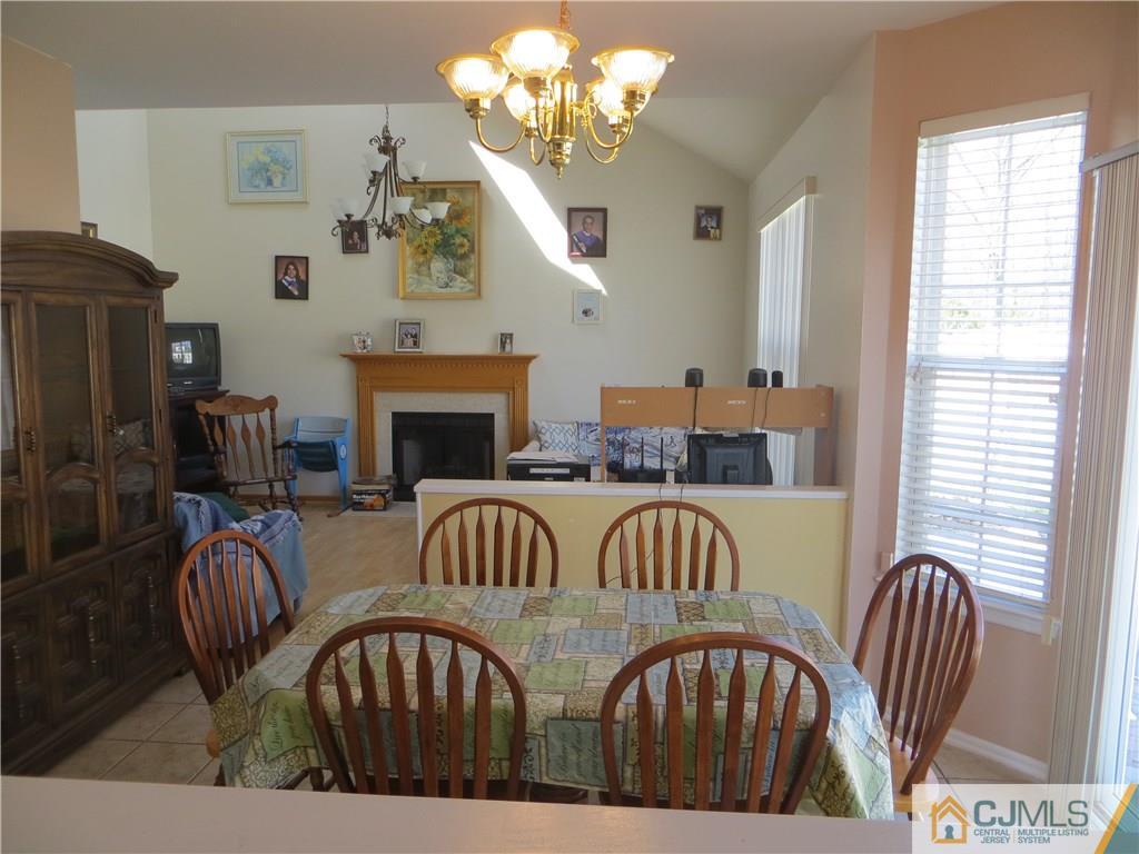 51 Stratton Road Old Bridge, NJ 07747 - Photo 9 of 25 a view of a dining room with furniture