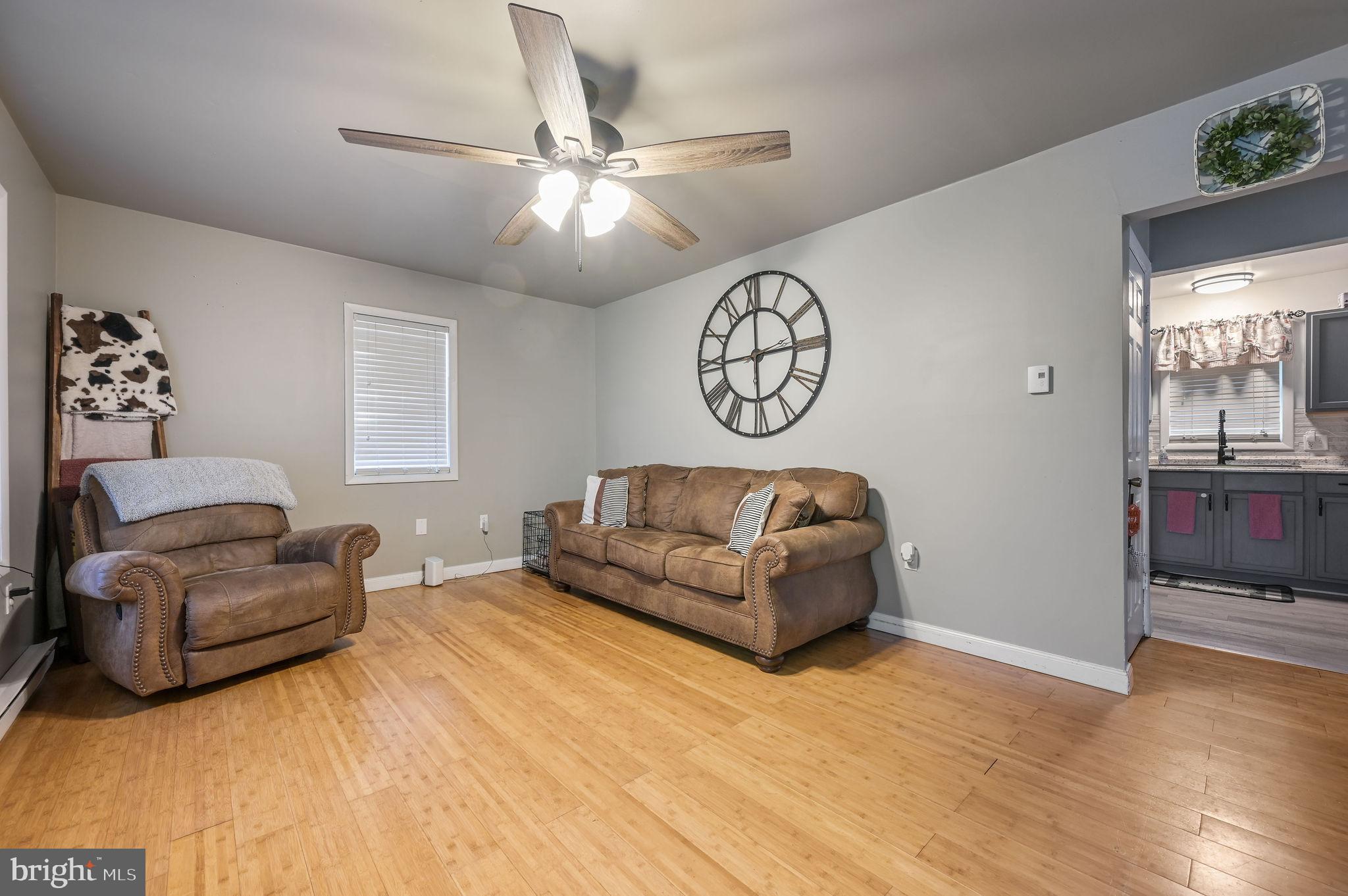 2314 Lockwood Chapel Road Dover, DE 19904 - Photo 7 of 20 a living room with furniture and a large window