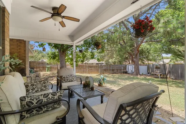 a view of an outdoor dining space with furniture