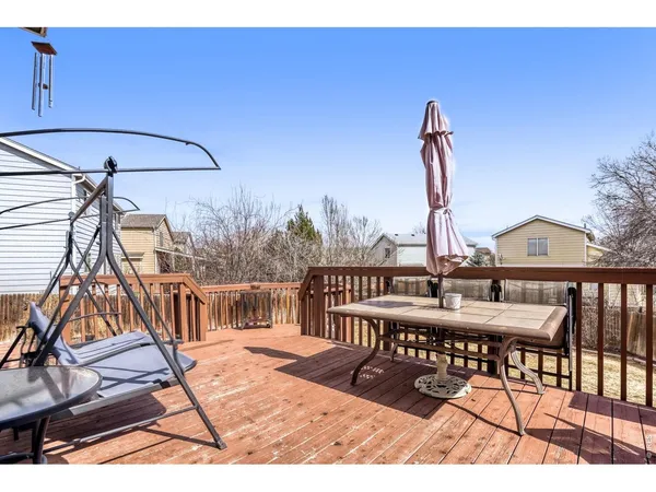 a view of a balcony with chairs