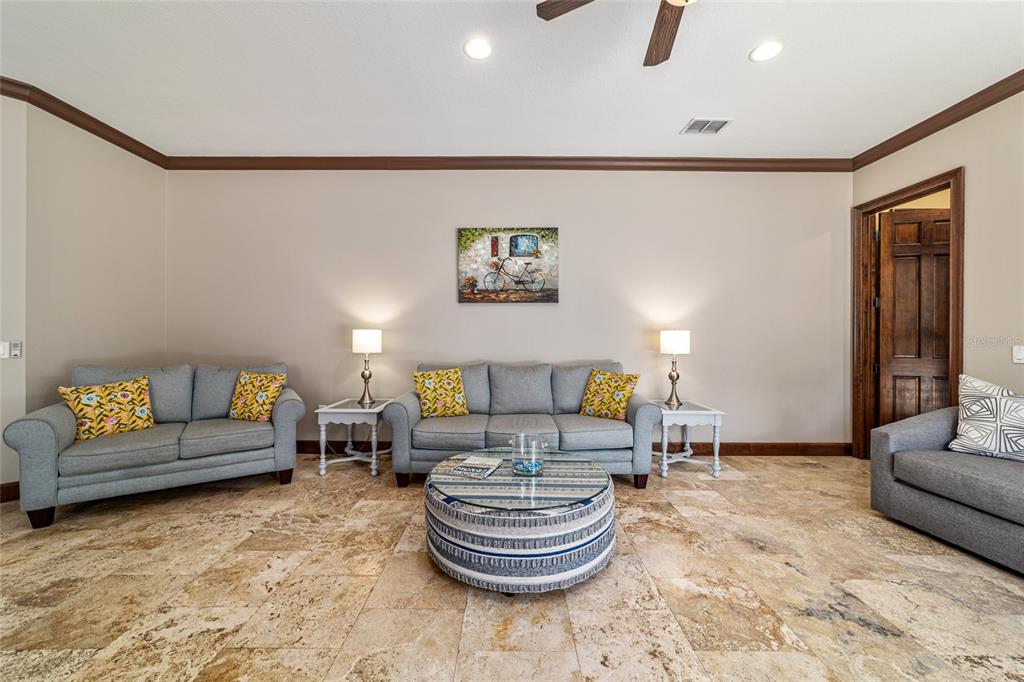 678 Southeast 47th Loop Ocala, FL 34480 - Photo 20 of 73 a living room with furniture and a couch