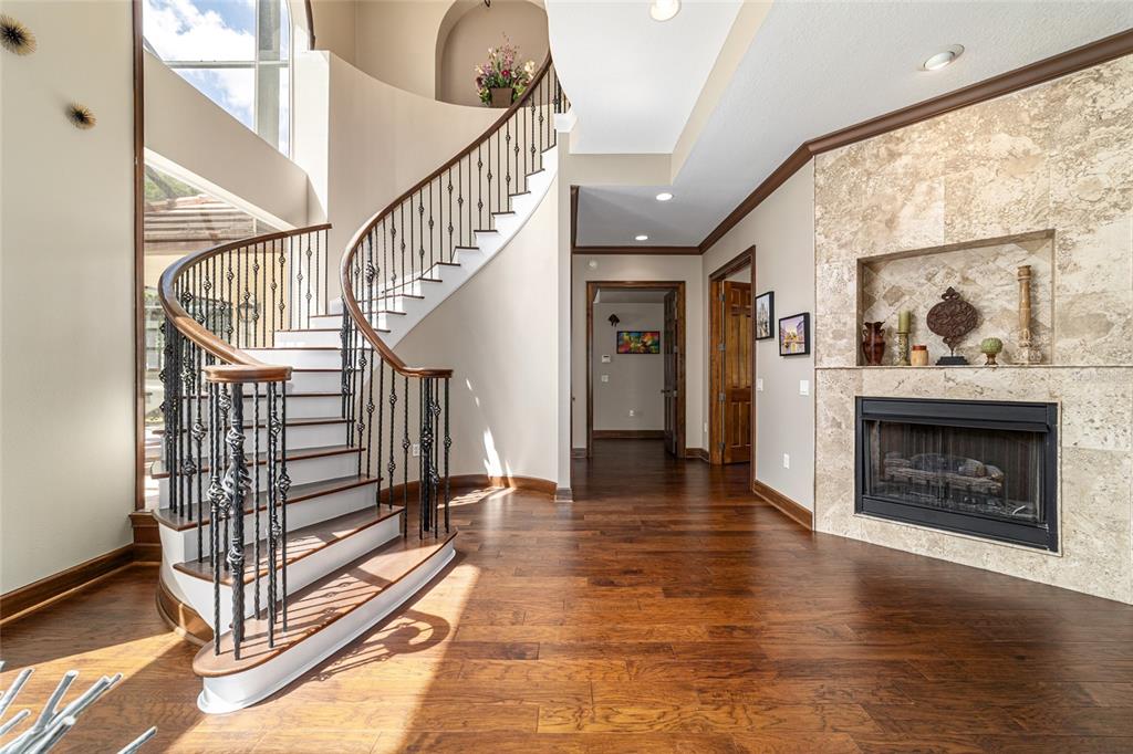 678 Southeast 47th Loop Ocala, FL 34480 - Photo 27 of 73 a view of entryway and hall with wooden floor