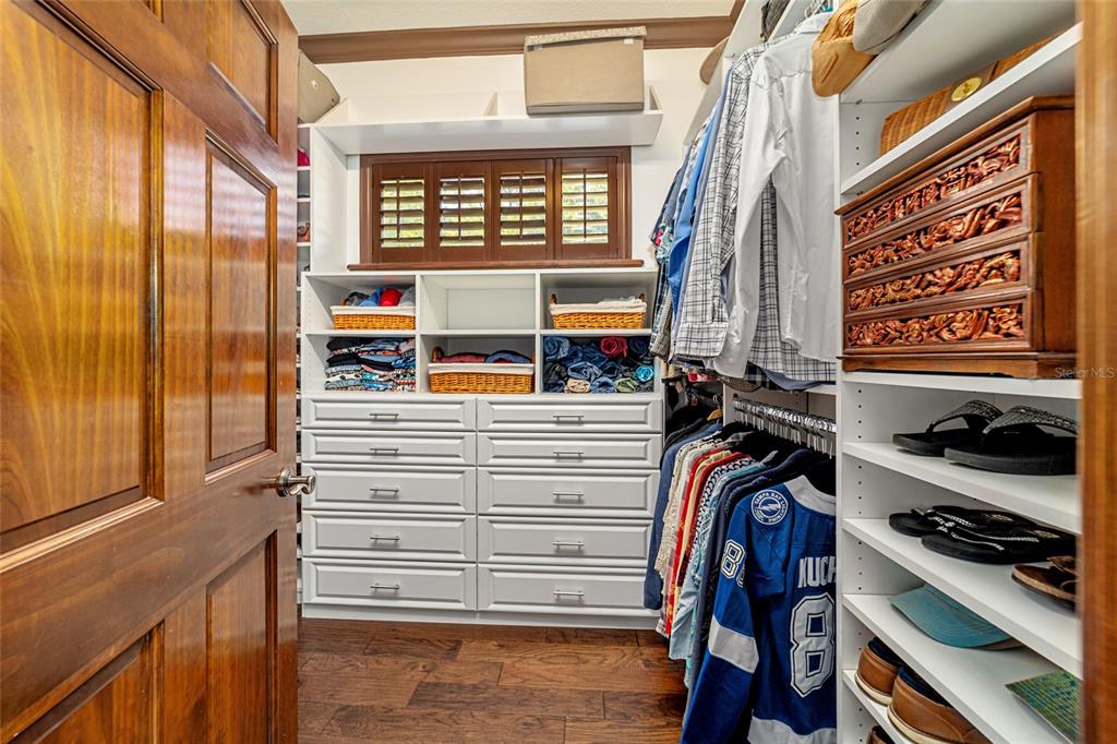 678 Southeast 47th Loop Ocala, FL 34480 - Photo 32 of 73 a view of walk in closet with clothes and shoes