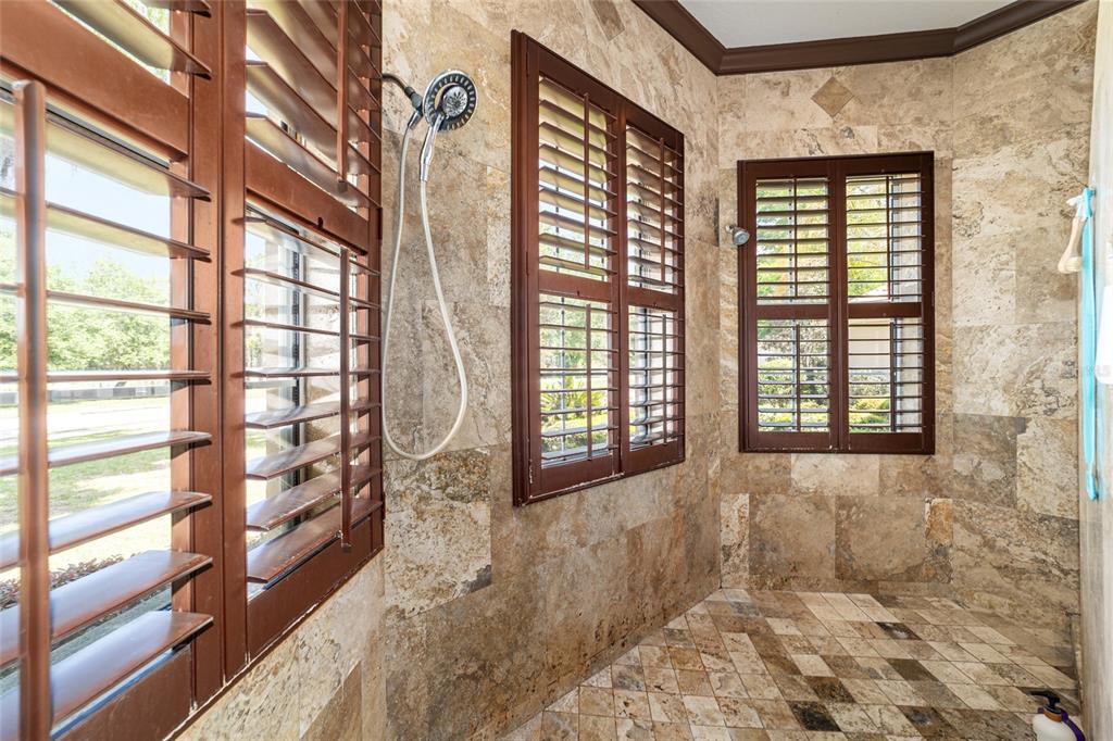 678 Southeast 47th Loop Ocala, FL 34480 - Photo 37 of 73 a view of a bathroom with a large window