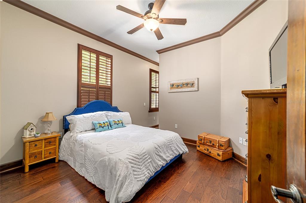 678 Southeast 47th Loop Ocala, FL 34480 - Photo 40 of 73 a bedroom with a bed and a window