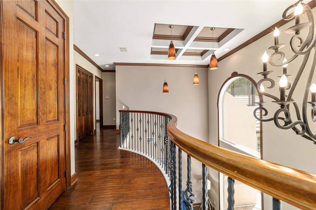 678 Southeast 47th Loop Ocala, FL 34480 - Photo 43 of 73 a view of a hallway with wooden floor and staircase