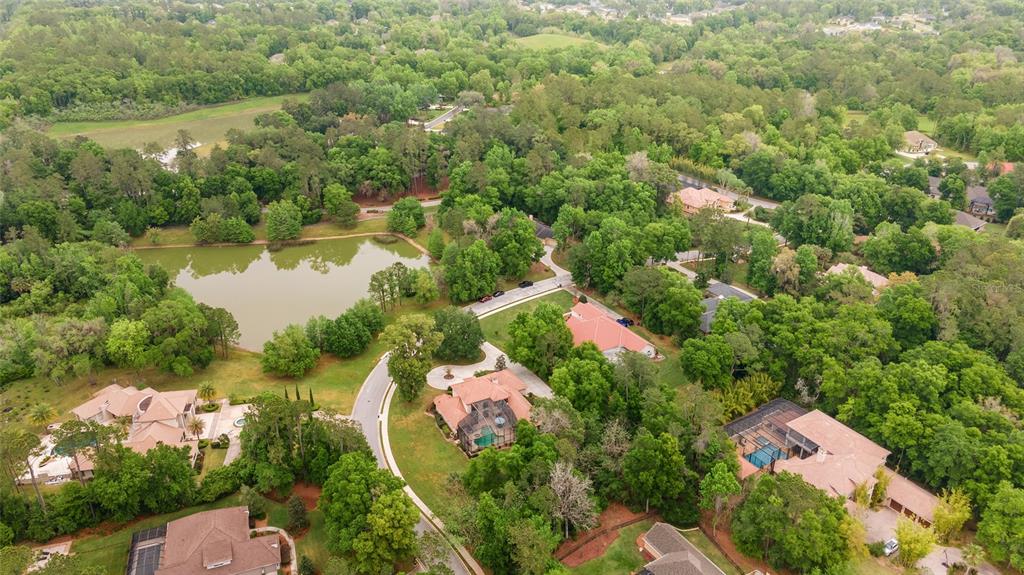 678 Southeast 47th Loop Ocala, FL 34480 - Photo 69 of 73 an aerial view of residential house with outdoor space and lake view