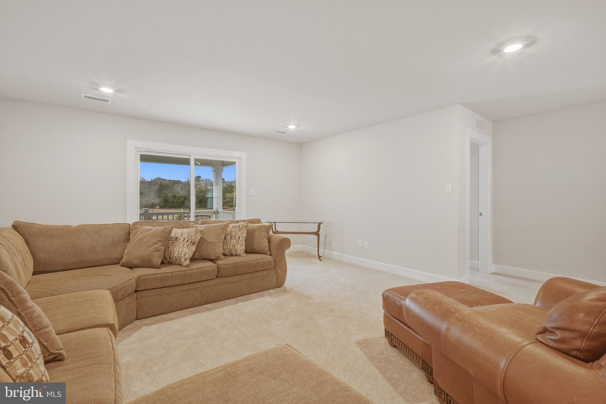 303 Southgate Road Cape May Court House, NJ 08210 - Photo 14 of 25 a living room with furniture and a window