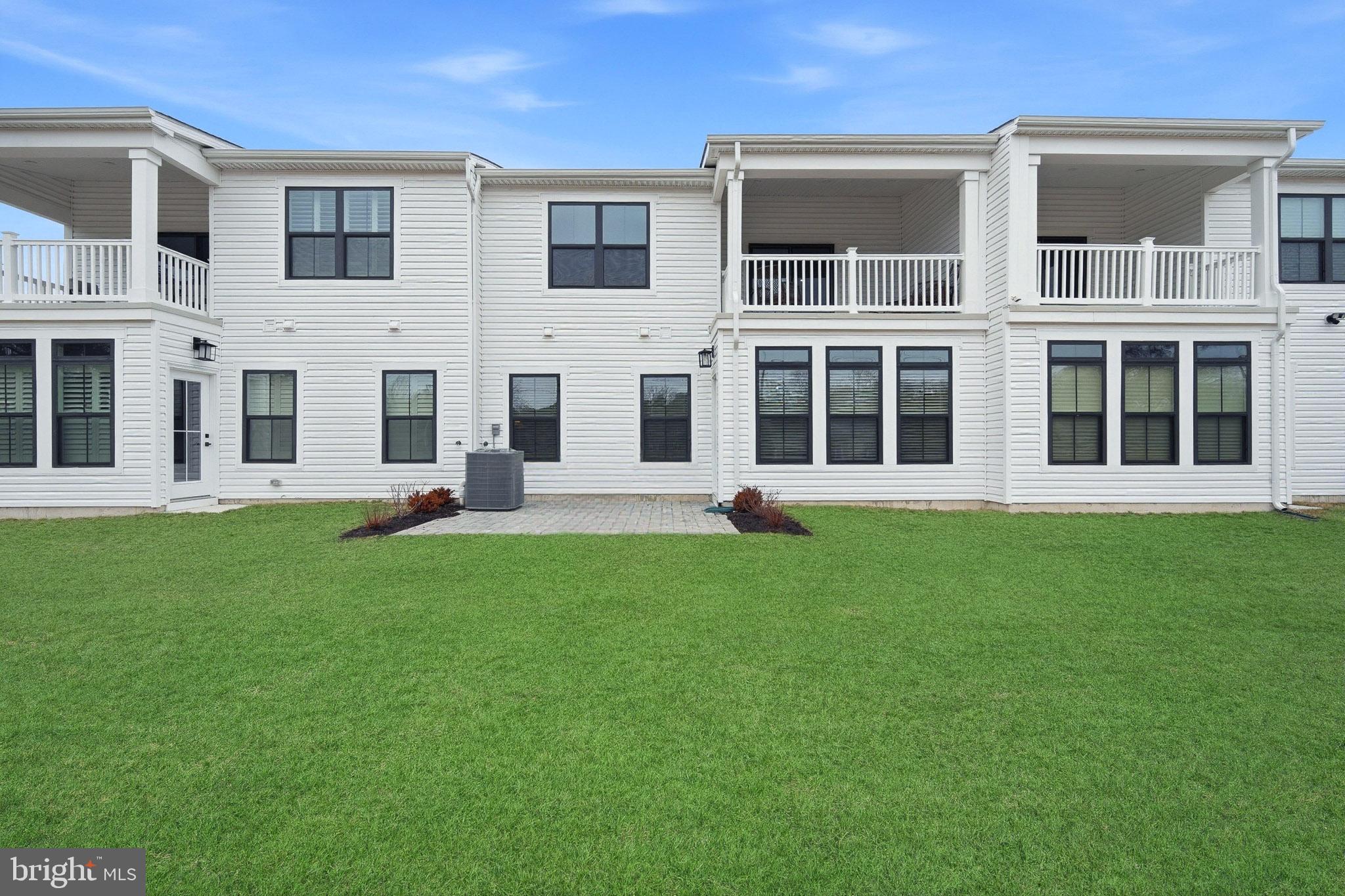 303 Southgate Road Cape May Court House, NJ 08210 - Photo 25 of 25 a large building with a yard